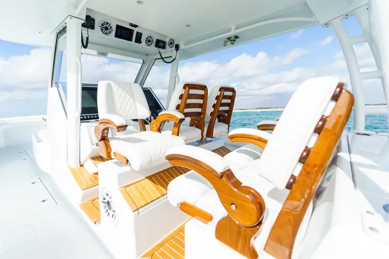 Slowmocean Yacht Photos Pics 2021 Barker Boatworks 40 HPC interior with luxurious seating and ocean view.