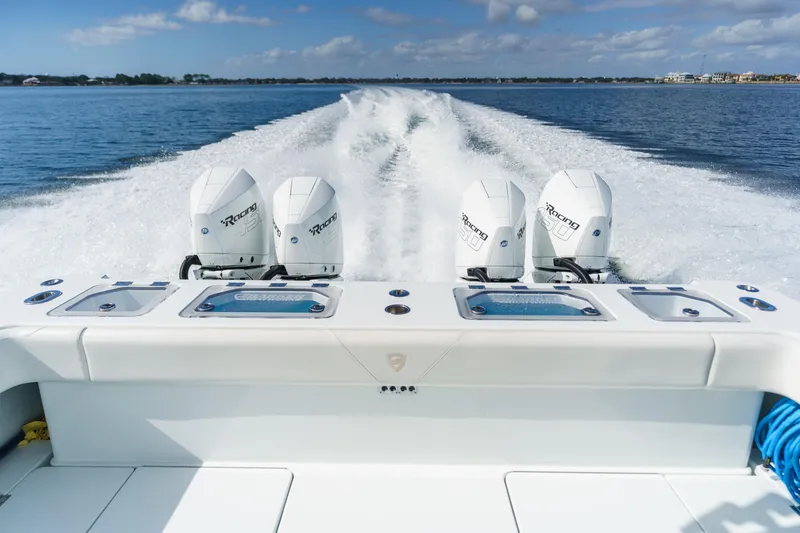 Slowmocean Yacht Photos Pics Barker Boatworks 40 HPC 2021 with powerful outboard engines cruising on open water.