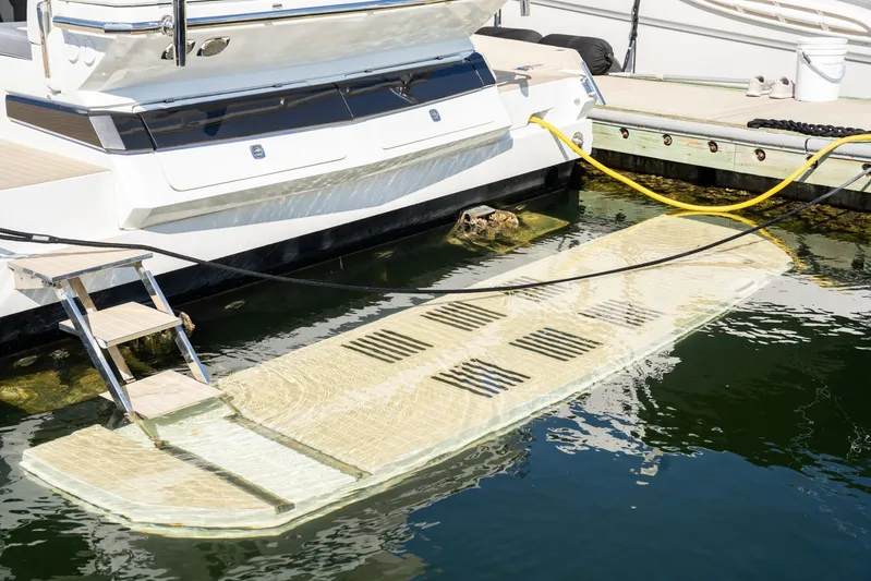  Yacht Photos Pics 2025 Galeon 400 Fly yacht with swim platform and dock connection.