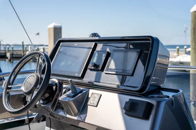  Yacht Photos Pics Helm of 2025 Galeon 400 Fly yacht with modern navigation displays.