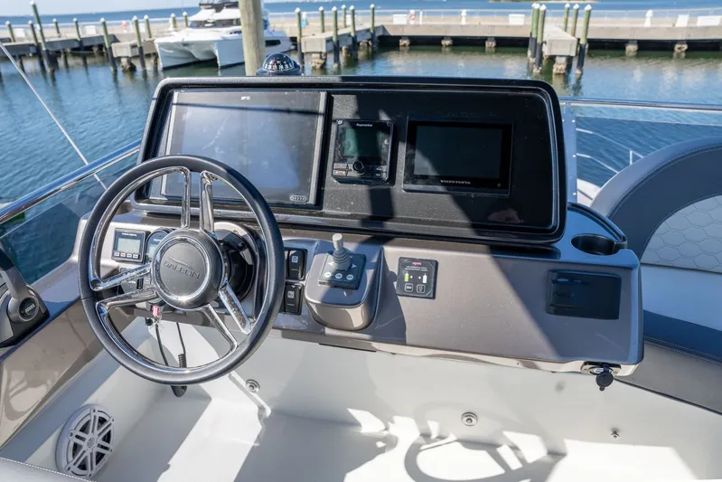  Yacht Photos Pics Helm of 2025 Galeon 400 Fly yacht with modern controls and navigation screens.