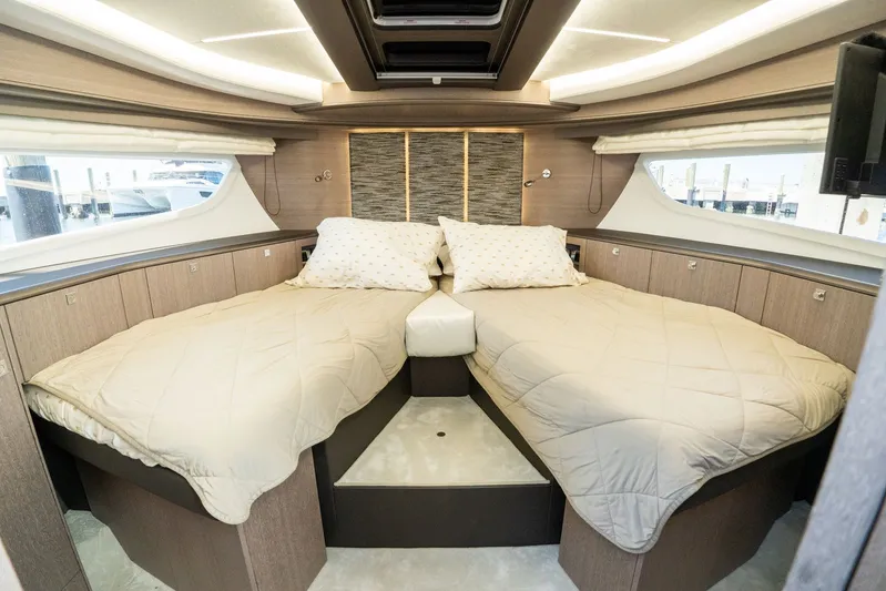  Yacht Photos Pics Luxurious cabin interior of 2025 Galeon 400 Fly yacht with twin beds and modern design.