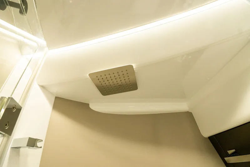  Yacht Photos Pics Modern showerhead in the 2025 Galeon 400 Fly yacht bathroom.