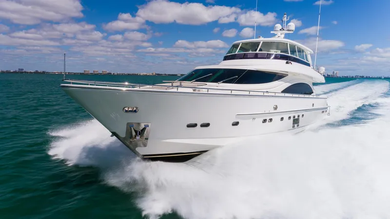 Satori Yacht Photos Pics Luxury 2016 Horizon E88 yacht cruising on open water under blue skies.