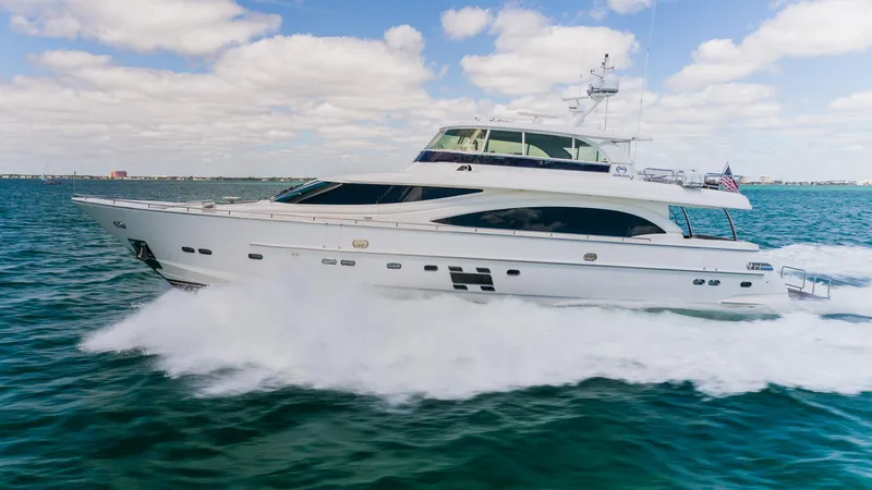 Satori Yacht Photos Pics 2016 Horizon E88 yacht cruising on open water under a partly cloudy sky.
