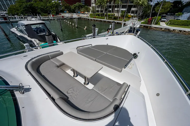 Satori Yacht Photos Pics Luxury seating area on 2016 Horizon E88 yacht with waterfront view.