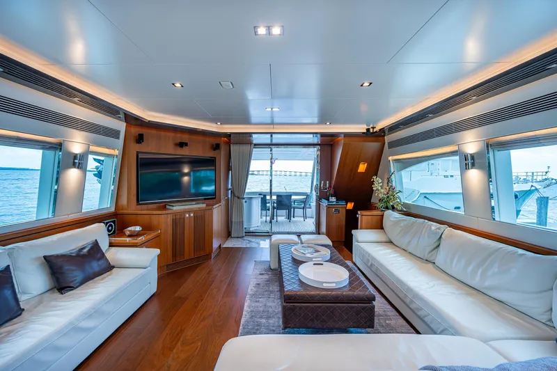 Satori Yacht Photos Pics Luxurious interior of 2016 Horizon E88 yacht with modern furnishings and ocean view.