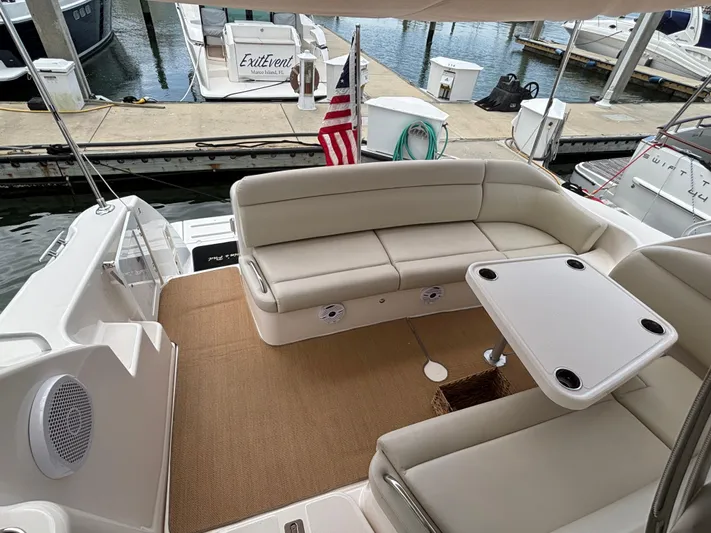 O Sea D Yacht Photos Pics 2008 Tiara Yachts 3900 Sovran with beige seating and table at a marina dock.