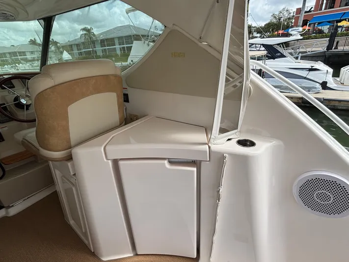 O Sea D Yacht Photos Pics 2008 Tiara Yachts 3900 Sovran interior with helm seat and storage compartment.