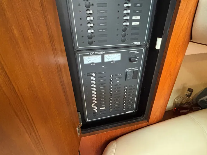O Sea D Yacht Photos Pics 2008 Tiara Yachts 3900 Sovran DC system panel with wooden cabinet.