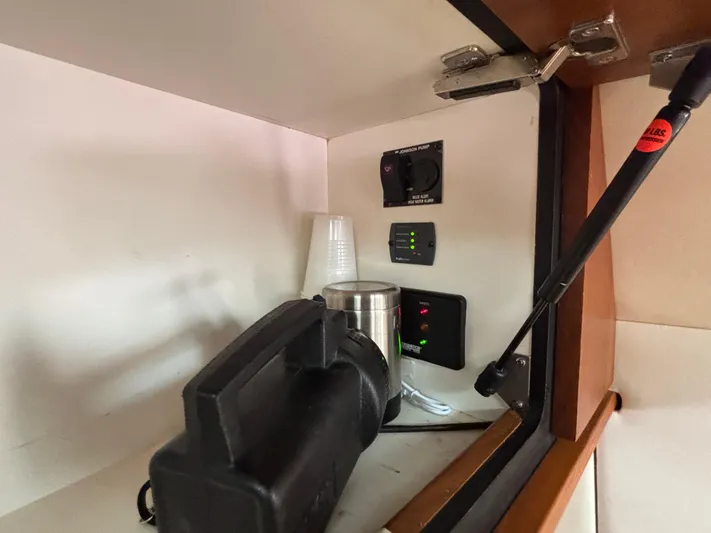 O Sea D Yacht Photos Pics 2008 Tiara Yachts 3900 Sovran interior cabinet with equipment and controls.