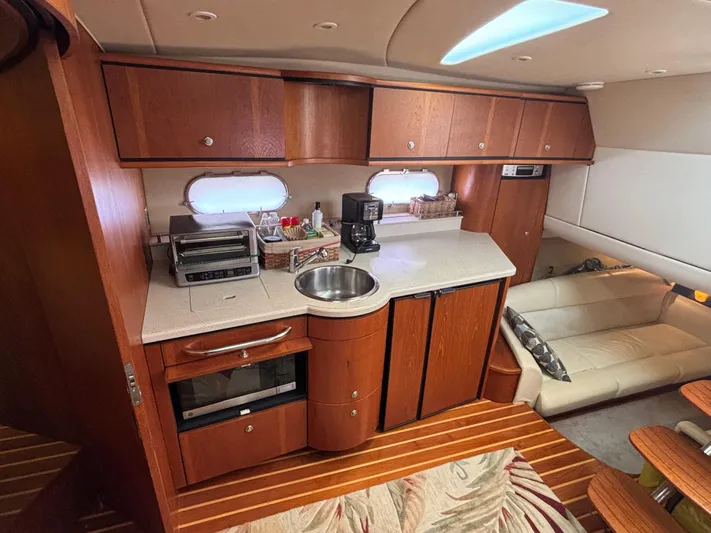 O Sea D Yacht Photos Pics 2008 Tiara Yachts 3900 Sovran interior with kitchen and seating area.