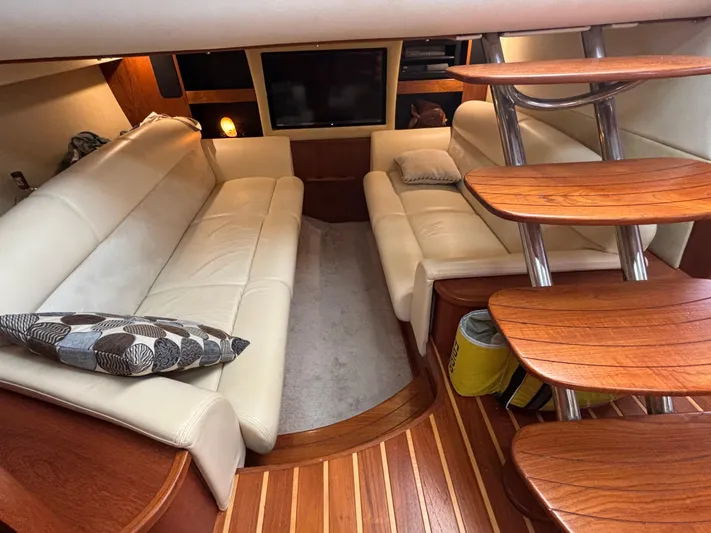 O Sea D Yacht Photos Pics 2008 Tiara Yachts 3900 Sovran interior with leather seating and wooden steps.