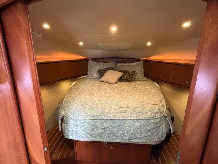 O Sea D Yacht Photos Pics Luxurious cabin interior of 2008 Tiara Yachts 3900 Sovran with cozy bedding.