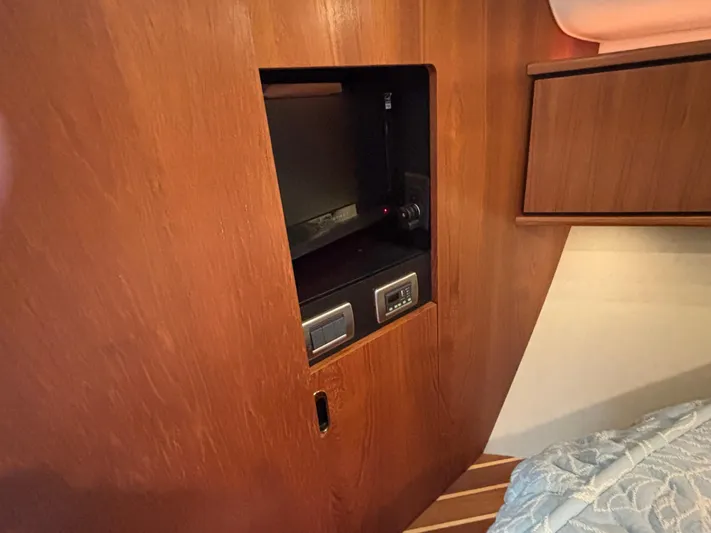 O Sea D Yacht Photos Pics 2008 Tiara Yachts 3900 Sovran interior with wooden cabinetry and built-in safe.