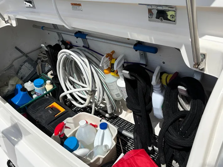 O Sea D Yacht Photos Pics Storage compartment of 2008 Tiara Yachts 3900 Sovran with cleaning supplies and equipment.