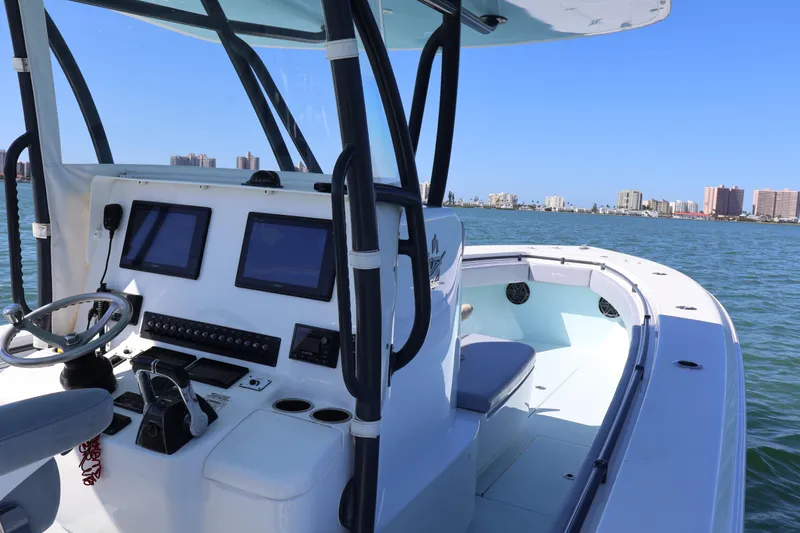 Wine Down Yacht Photos Pics 2017 Contender 35 ST boat dashboard with city skyline in the background.