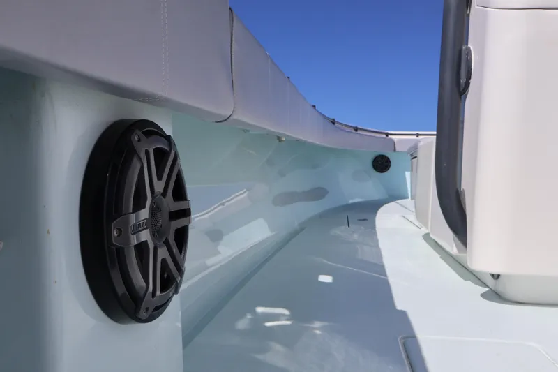 Wine Down Yacht Photos Pics 2017 Contender 35 ST boat interior with speaker, sleek design, and blue sky background.