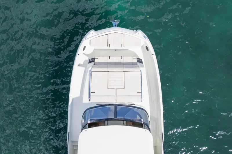 Yacht Photos Pics Aerial view of 2025 Catana YOT 36 yacht on clear turquoise water.