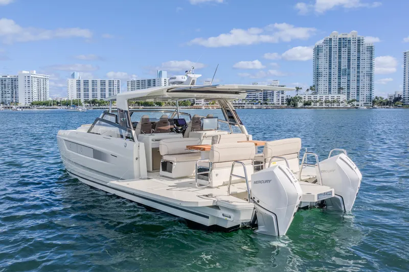  Yacht Photos Pics Modern Catana YOT 36 boat on water, city skyline in background, 2025 model.