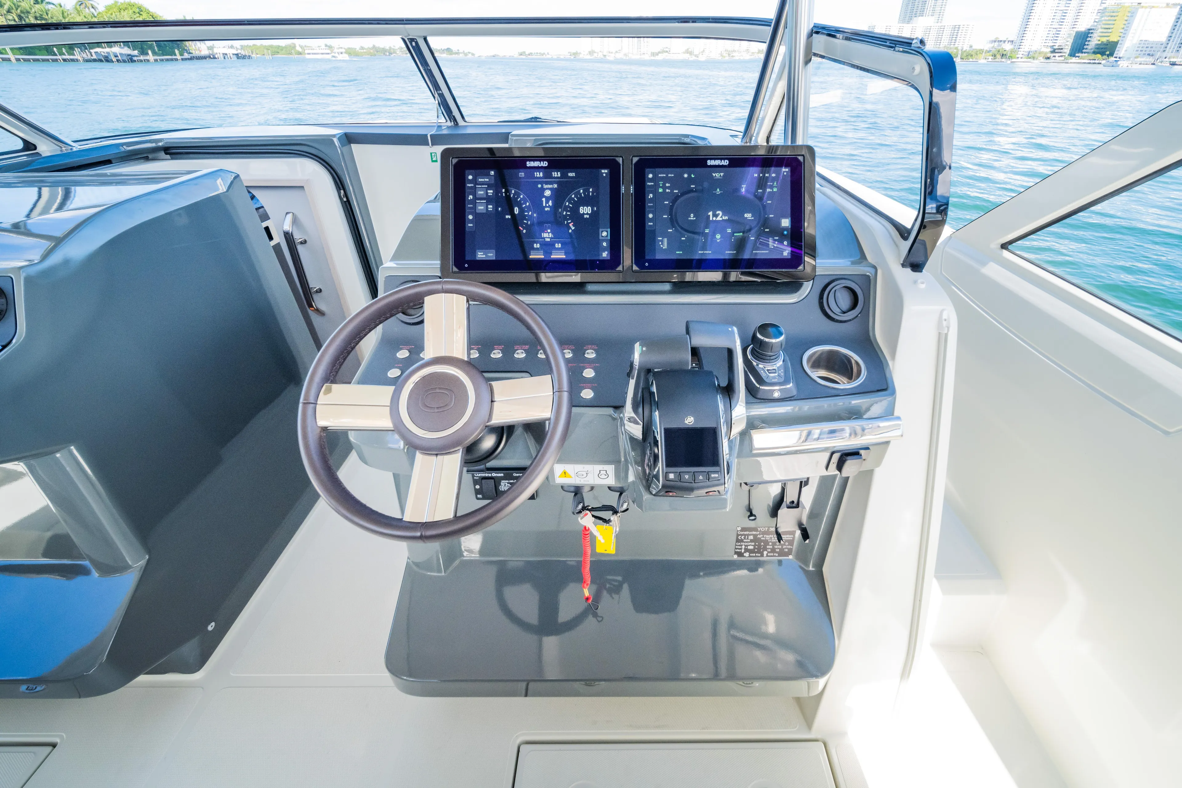  Yacht Photos Pics Modern helm of 2025 Catana YOT 36 yacht with dual displays and steering wheel.