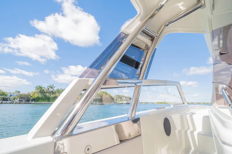  Yacht Photos Pics Catana YOT 36 boat interior with chrome details, overlooking a scenic waterfront.