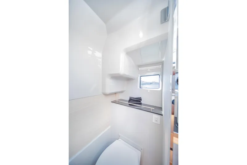  Yacht Photos Pics Modern bathroom interior of 2025 Catana YOT 36 yacht with sleek design and window view.