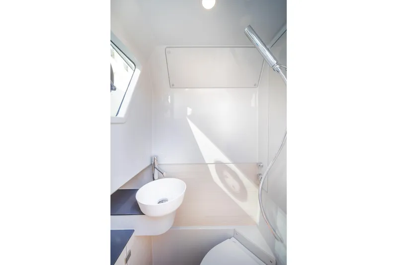  Yacht Photos Pics Modern bathroom interior of Catana YOT 36, 2025 model, featuring sleek design and fixtures.