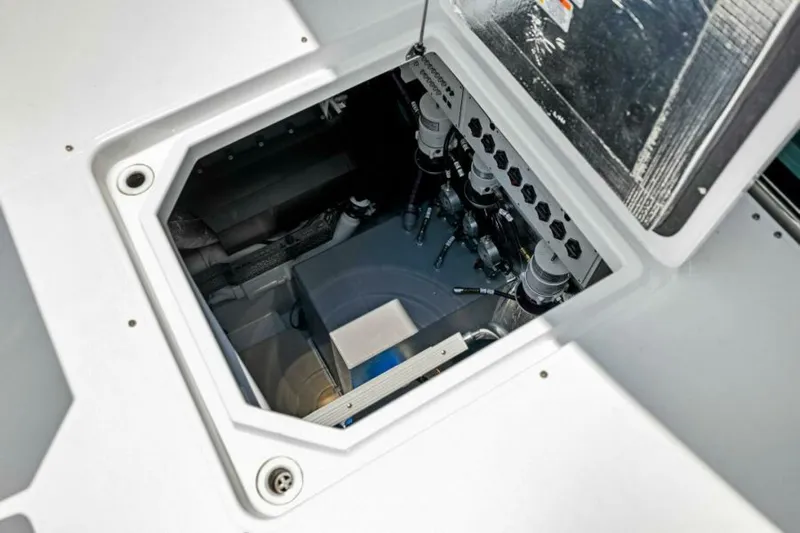 Mint 2 Bee Yacht Photos Pics Engine compartment of 2022 Cruisers Yachts 50 Cantius, showcasing mechanical components and systems.