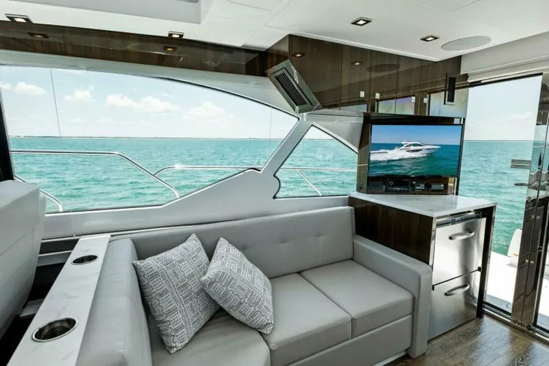 Mint 2 Bee Yacht Photos Pics Luxurious interior of 2022 Cruisers Yachts 50 Cantius with ocean view and modern amenities.