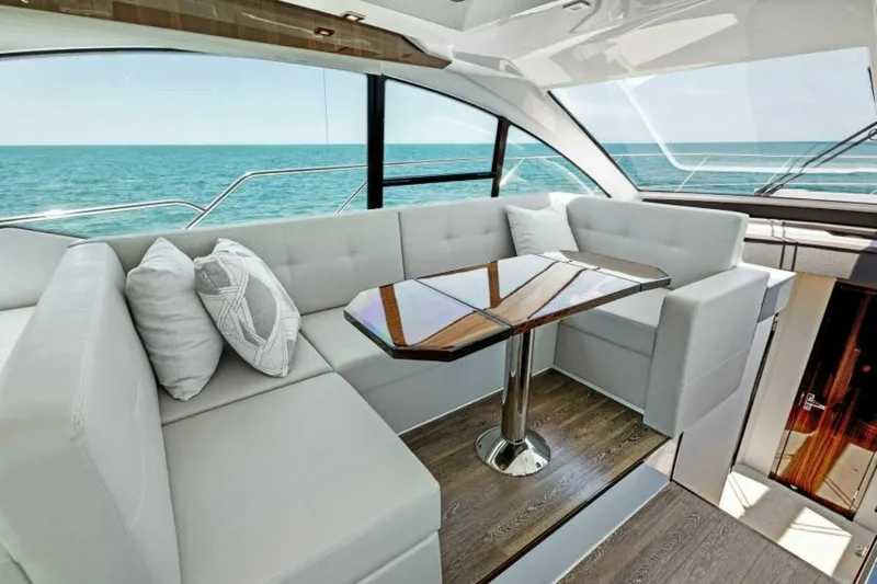 Mint 2 Bee Yacht Photos Pics Luxurious interior of 2022 Cruisers Yachts 50 Cantius with ocean view.