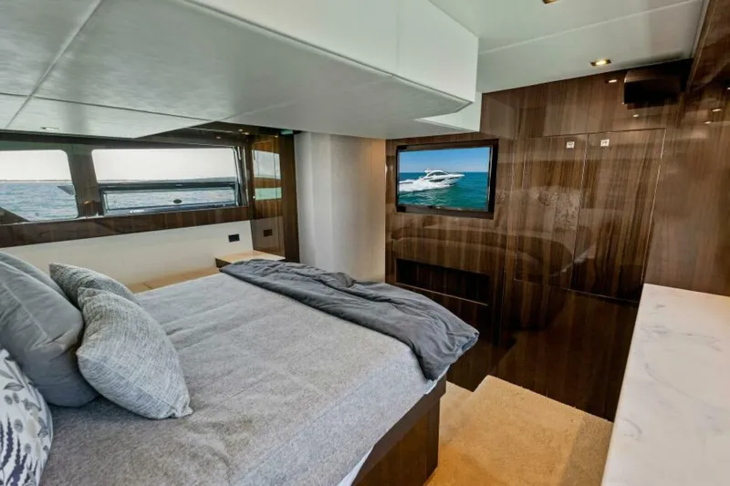 Mint 2 Bee Yacht Photos Pics Luxurious bedroom interior of 2022 Cruisers Yachts 50 Cantius with modern design and ocean view.