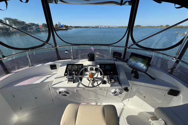  Yacht Photos Pics Helm of 2006 Albin 40 North Sea Cutter with navigation equipment and scenic water view.