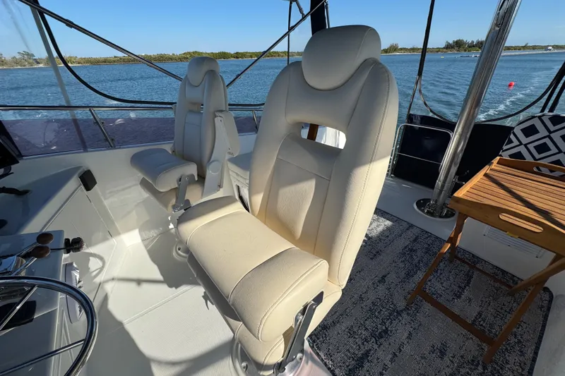  Yacht Photos Pics Interior of 2006 Albin 40 North Sea Cutter with beige seating and ocean view.