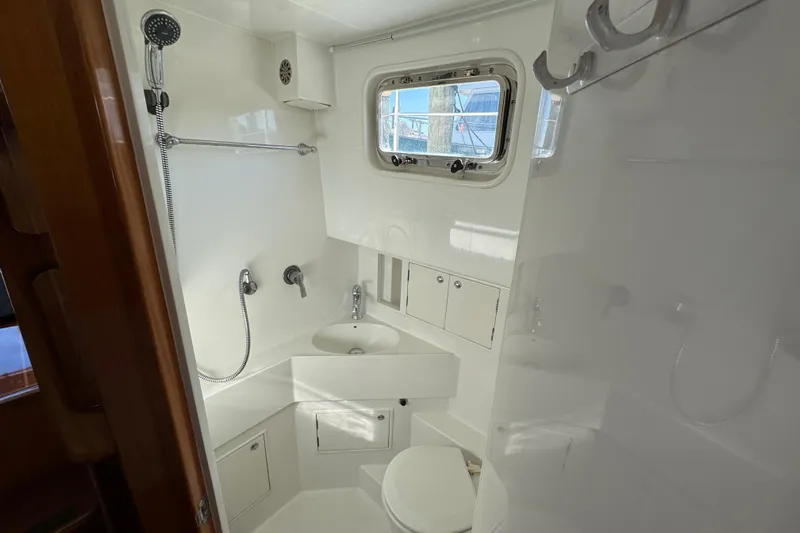  Yacht Photos Pics Bathroom interior of 2006 Albin 40 North Sea Cutter, featuring shower and sink.