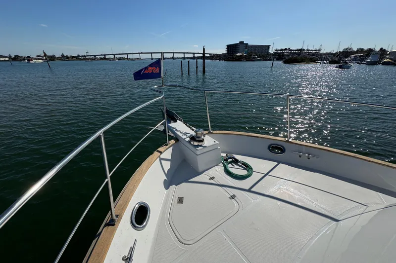  Yacht Photos Pics Bow view of 2006 Albin 40 North Sea Cutter on calm water, sunny day.