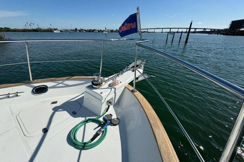  Yacht Photos Pics Bow view of 2006 Albin 40 North Sea Cutter on calm waters, featuring deck equipment.