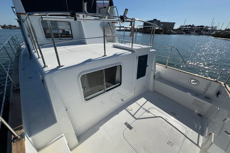  Yacht Photos Pics 2006 Albin 40 North Sea Cutter on calm water, showcasing deck and railing.