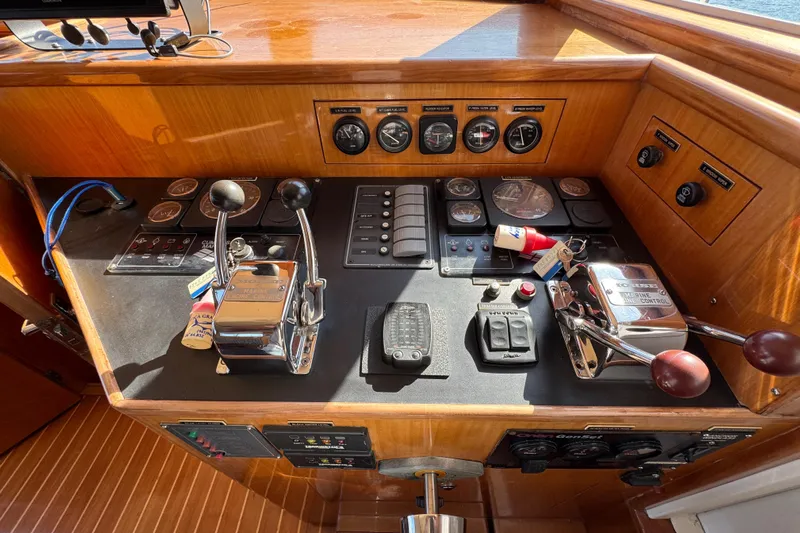 Yacht Photos Pics Control panel of a 2006 Albin 40 North Sea Cutter boat with gauges and levers.