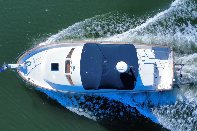  Yacht Photos Pics Aerial view of 2006 Albin 40 North Sea Cutter cruising on water.