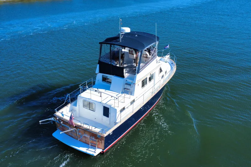  Yacht Photos Pics 2006 Albin 40 North Sea Cutter cruising on calm blue waters.
