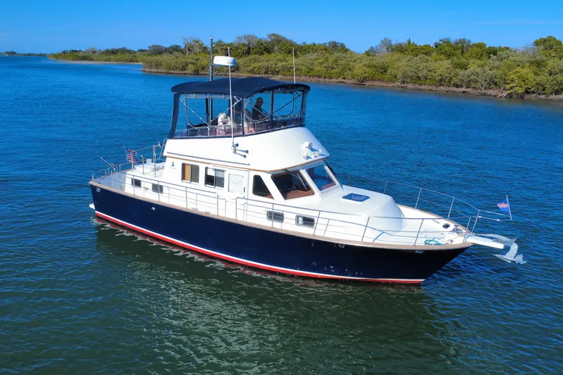  Yacht Photos Pics 2006 Albin 40 North Sea Cutter cruising on calm blue waters.