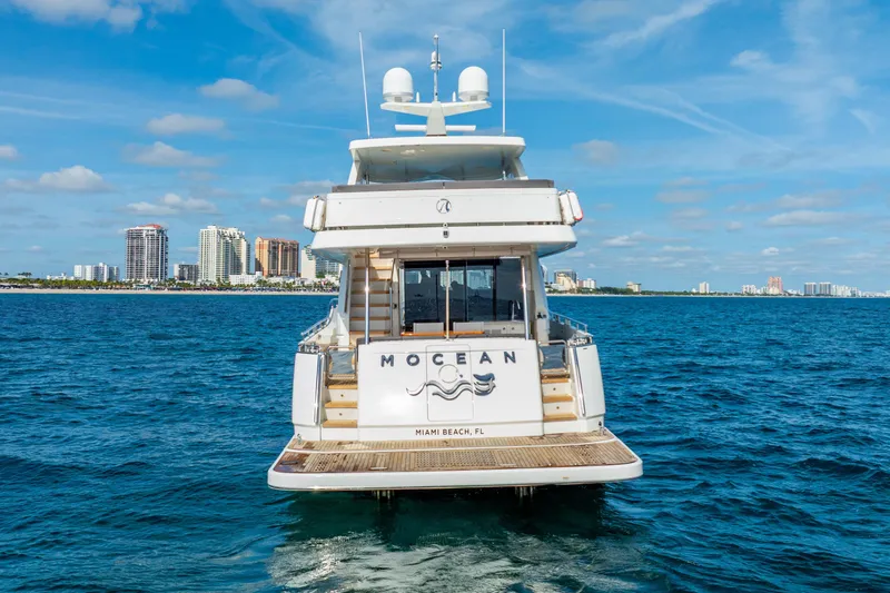 Mocean Yacht Photos Pics Ocean Alexander 70E Motoryacht 2021 cruising near Miami Beach skyline.