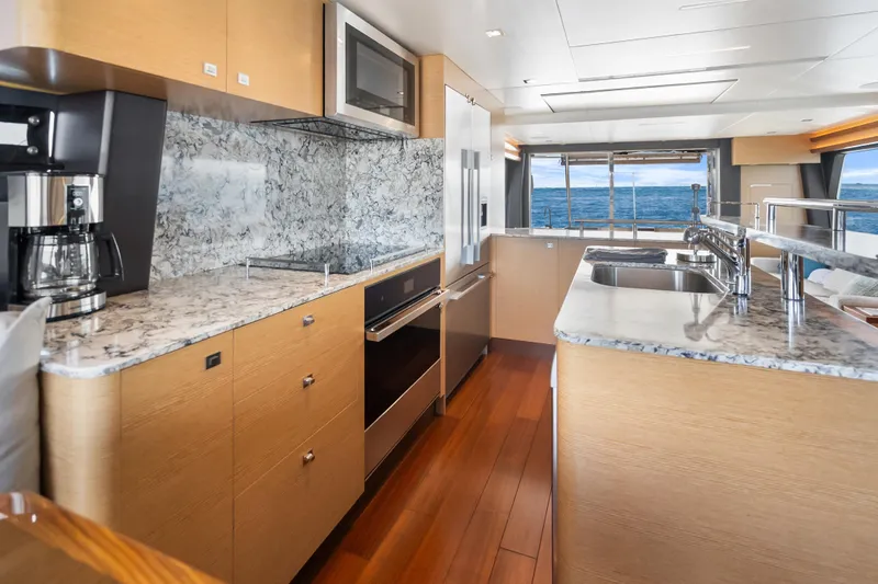 Mocean Yacht Photos Pics Luxurious kitchen interior of 2021 Ocean Alexander 70E Motoryacht with ocean view.