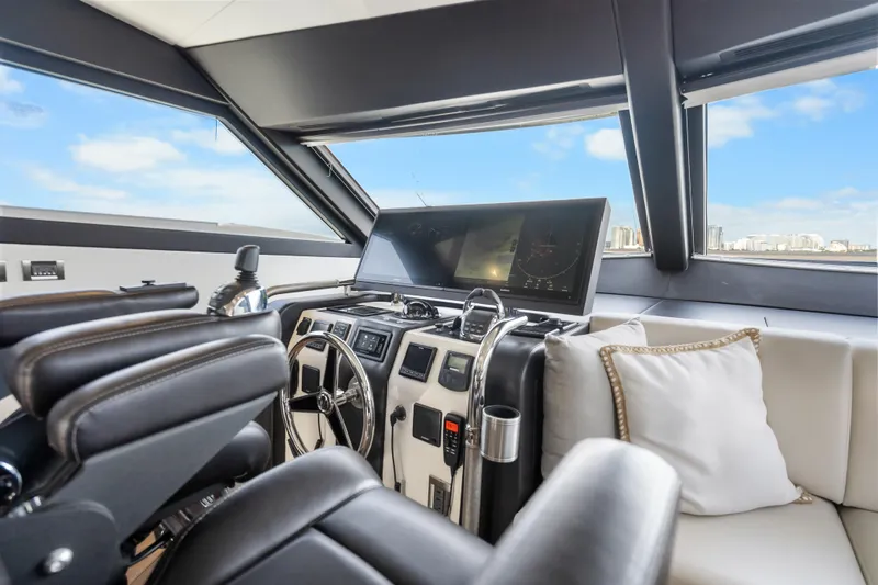 Mocean Yacht Photos Pics Interior helm of 2021 Ocean Alexander 70E Motoryacht with modern controls and panoramic view.