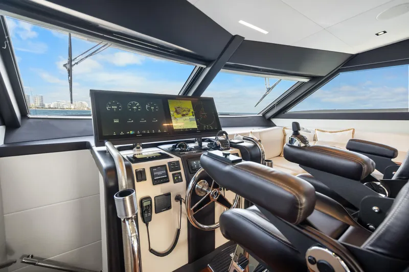 Mocean Yacht Photos Pics 2021 Ocean Alexander 70E Motoryacht helm with modern controls and panoramic windows.