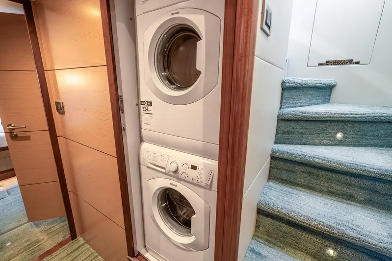Mocean Yacht Photos Pics Laundry area in 2021 Ocean Alexander 70E Motoryacht with stacked washer and dryer.