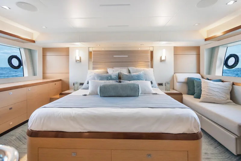 Mocean Yacht Photos Pics Luxurious bedroom interior of 2021 Ocean Alexander 70E Motoryacht with ocean view windows.