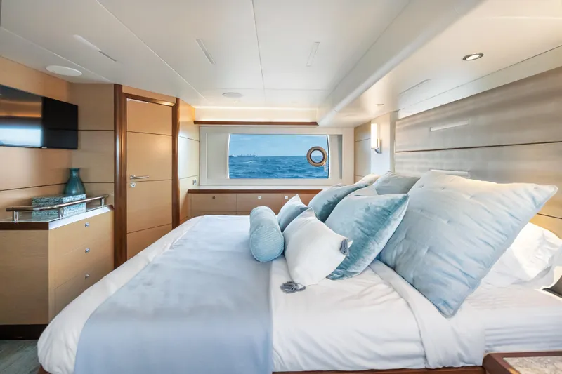 Mocean Yacht Photos Pics Luxurious bedroom interior of 2021 Ocean Alexander 70E Motoryacht with ocean view.