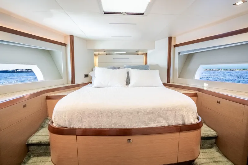 Mocean Yacht Photos Pics Luxurious bedroom interior of 2021 Ocean Alexander 70E Motoryacht with ocean view windows.